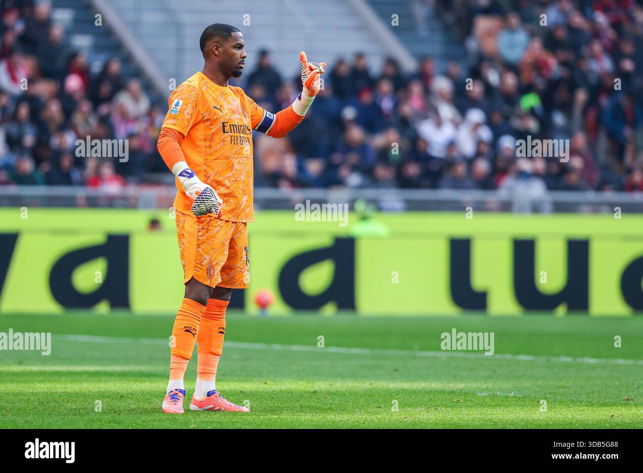 Mike Maignan of AC Milan gestures during Serie A 2025/26 football match ...