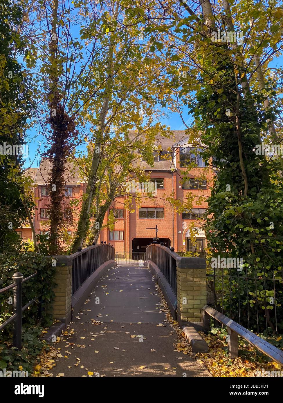 Footbridge over The River Colne towards Church Street in Staines-upon-Thames in Surrey, UK - Smartphone Captured Stock Image