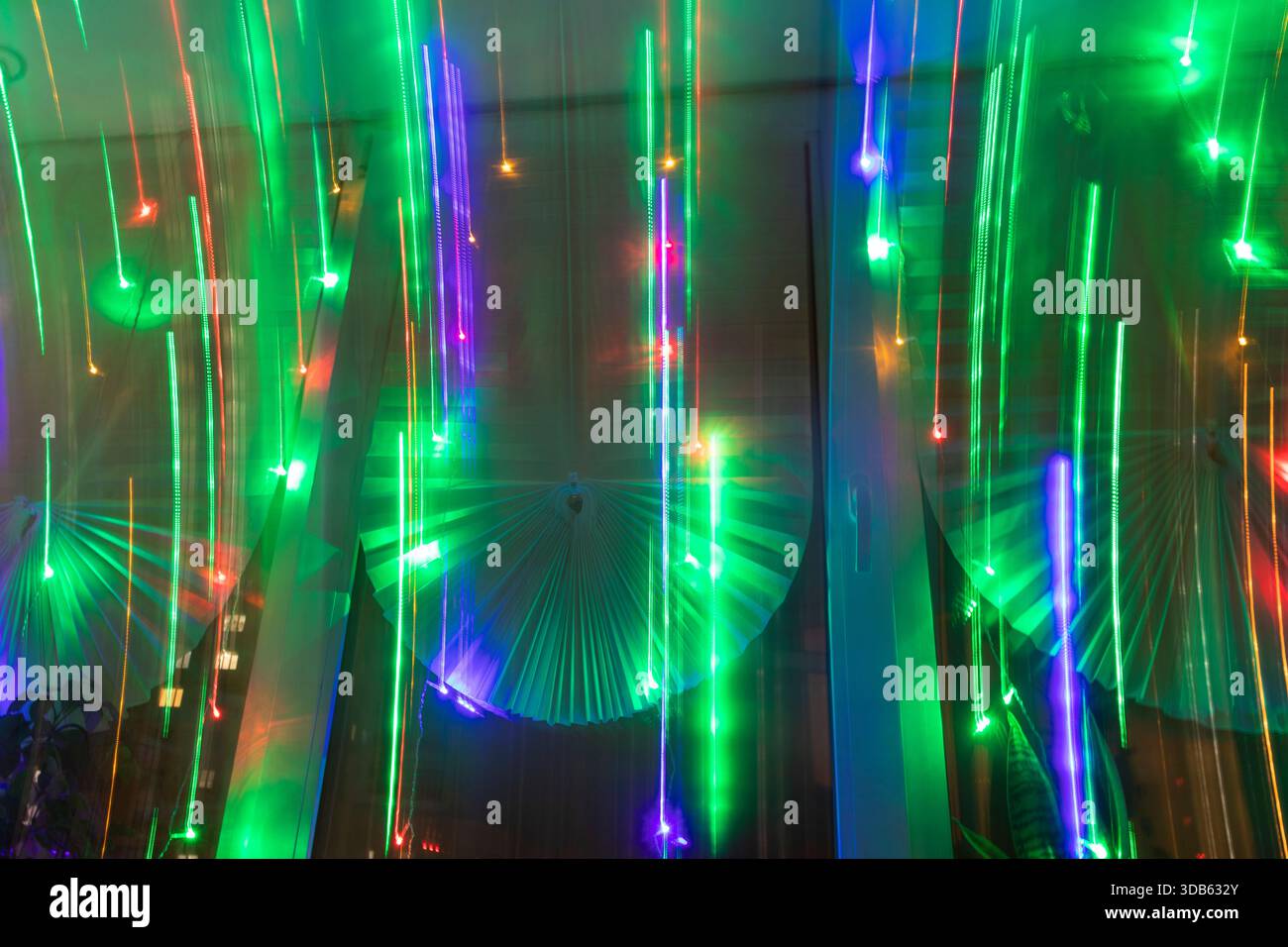 Abstract background where image shows light trails from garlands Stock Photo