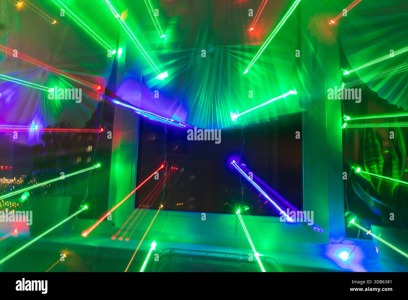 Abstract background where image shows light trails from garlands Stock Photo