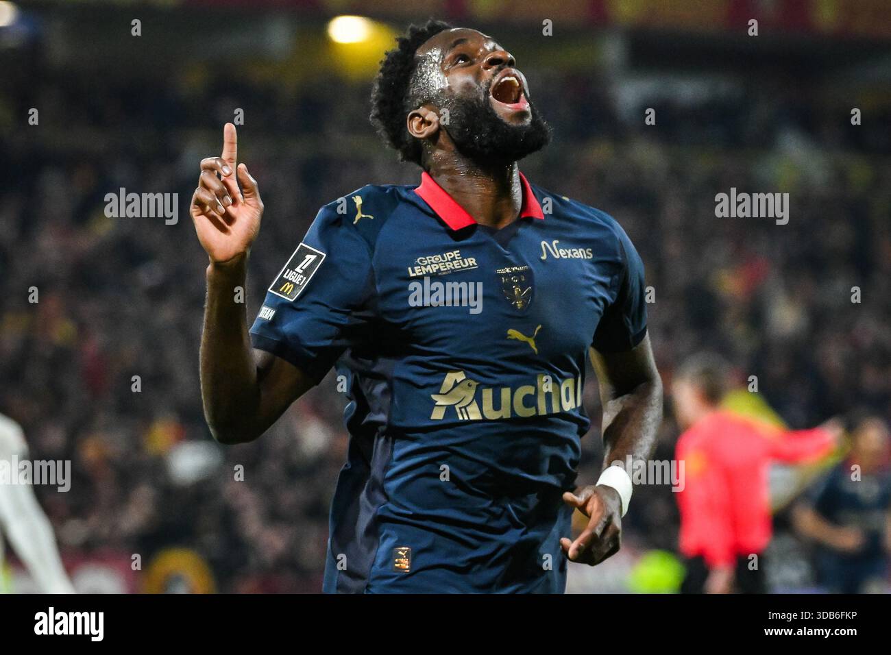 Lens, France, France. 14th Dec, 2025. Odsonne EDOUARD of Lens celebrates his goal during the Ligue 1 match between RC Lens and OGC Nice at Bollaert-Delelis Stadium on December 14, 2025 in Lens, France, France. 14th Dec, 2025. Odsonne EDOUARD of Lens celebrates his goal during the Ligue 1 match between RC Lens and OGC Nice at Bollaert-Delelis Stadium on December 14, 2025 in
