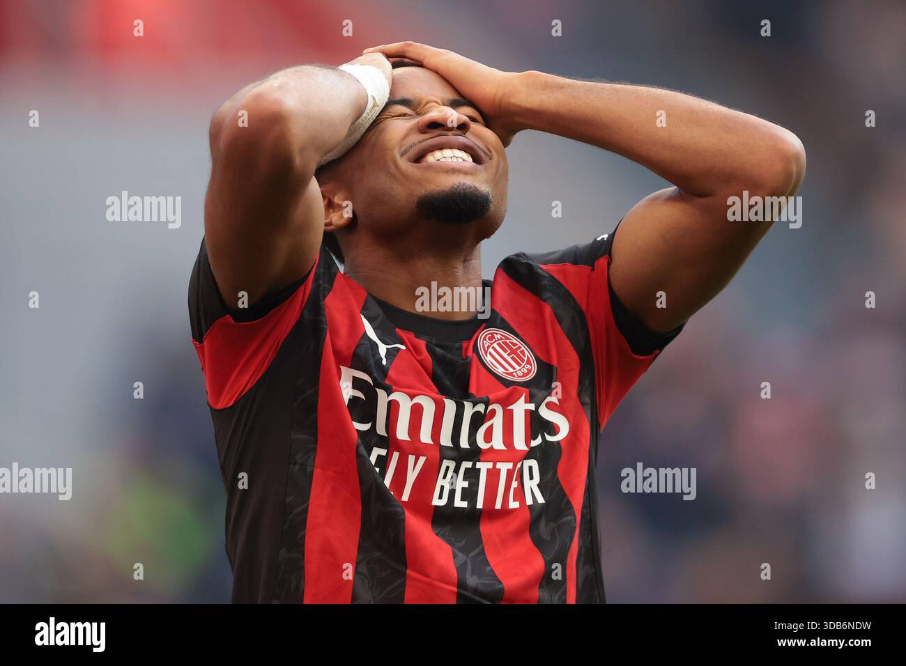 Milan, Italy, 14th December 2025. Christopher Nkunku of AC Milan reacts ...