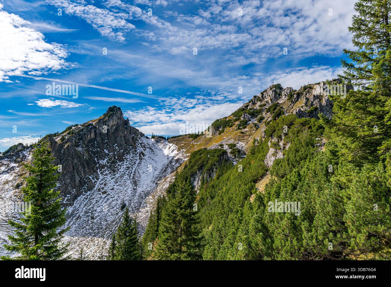 A breathtaking alpine hike captures crisp autumn beauty with rugged ...