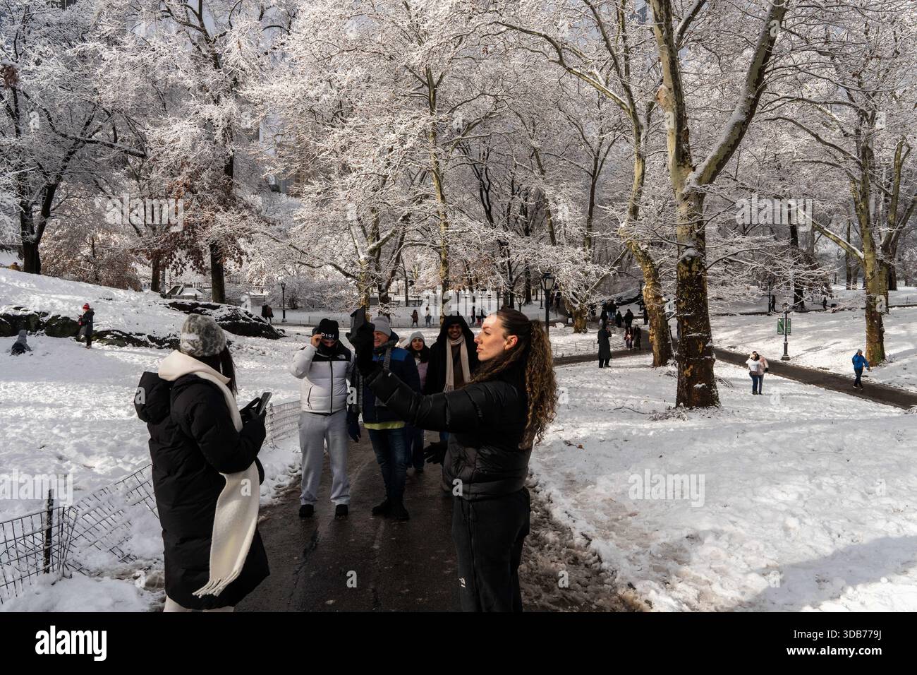 A person takes a selfie in Central Park after snow fall, Sunday, Dec ...