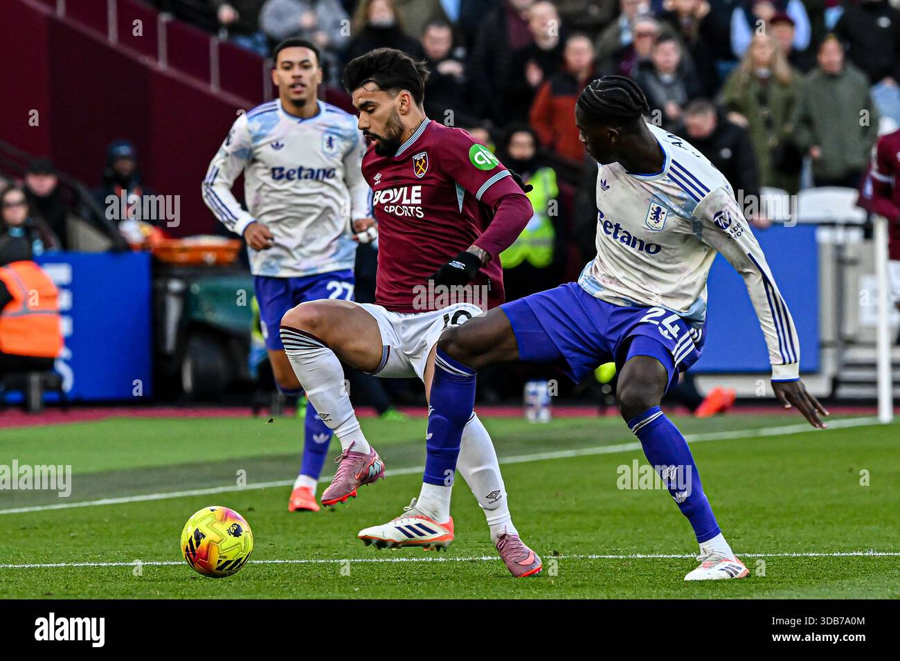Lucas Paqueta of West Ham challenegd by Amadou Onana of Aston Villa ...