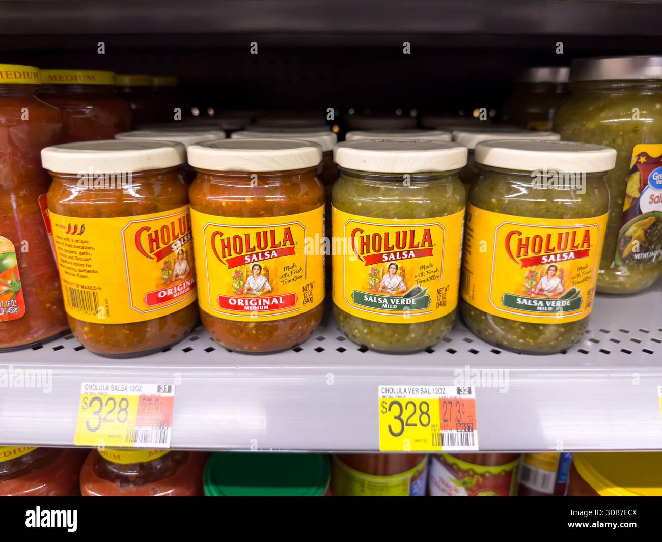 Los Angeles, California, United States - 09-30-2023: A view of several jars of Cholula salsa, on display at a local grocery store. Stock Photo