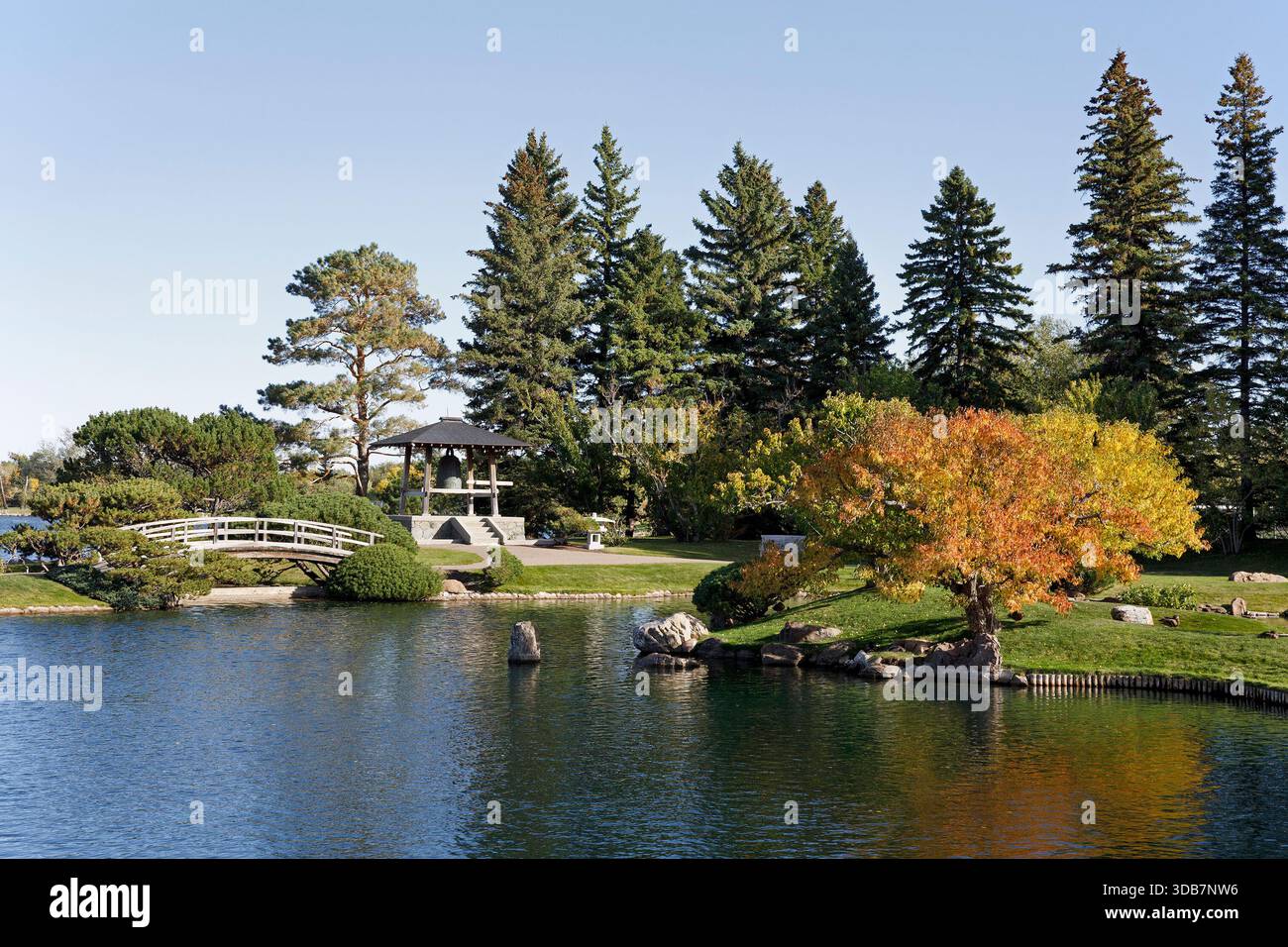 Nikka Yuko Japanese Garden lake and footbridge to friendship bell. Stock Photo