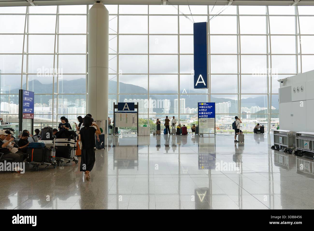 Hong Kong, China - September 25, 2025: The departure level area with A ...