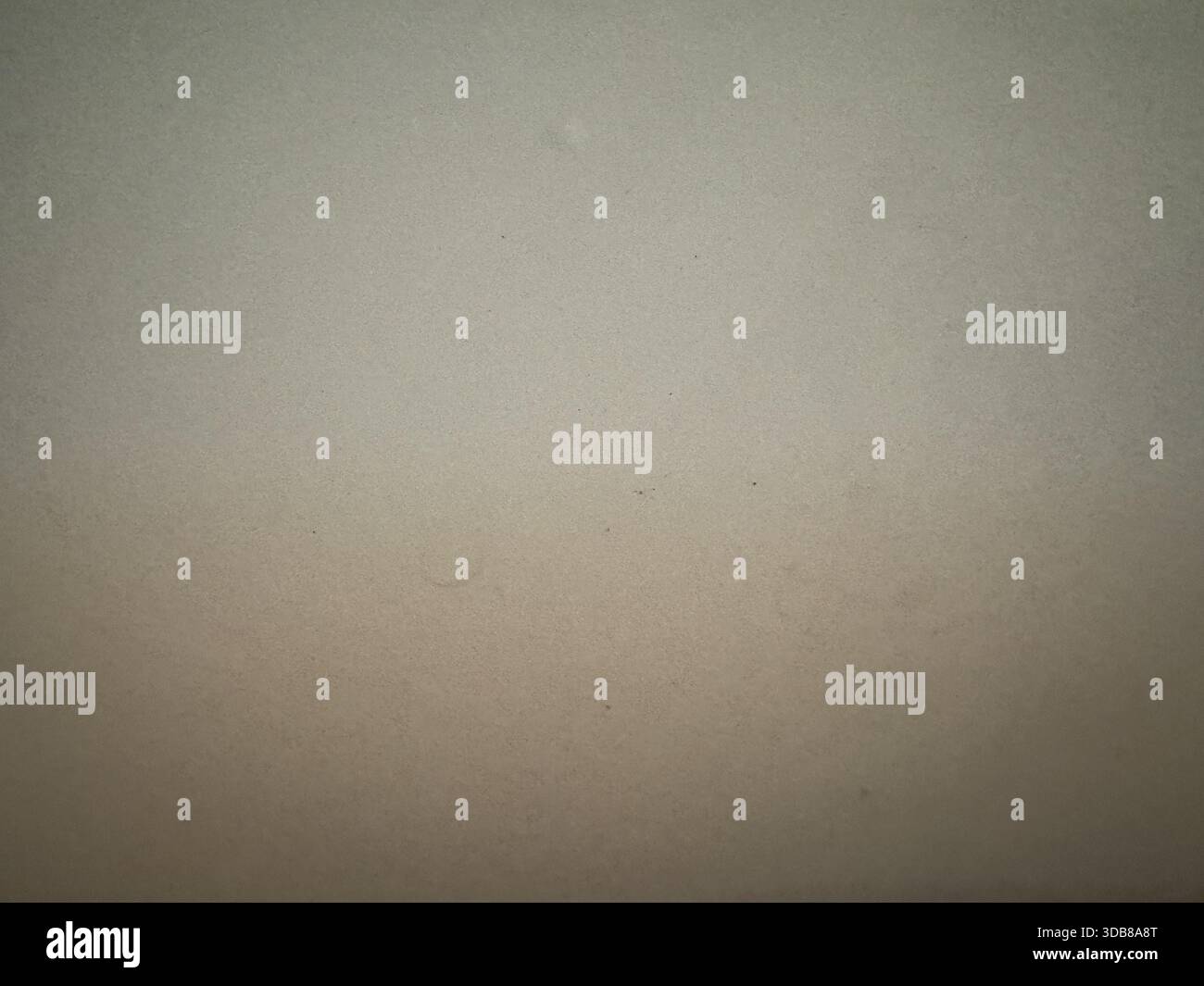 Abstract beige gray gradient with subtle texture providing a minimalist background Stock Photo