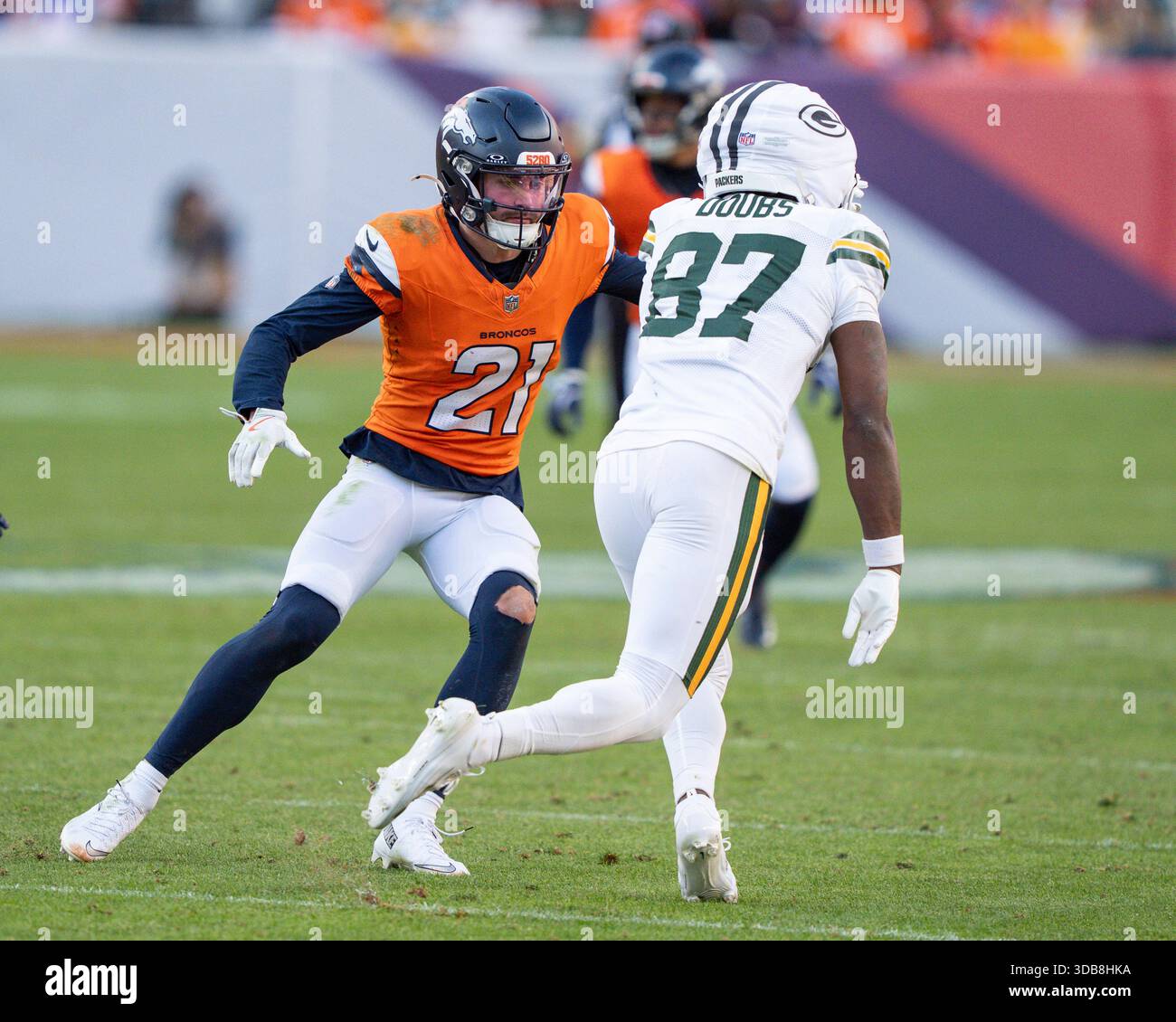 Riley Romeo December 14, 2025: Denver Broncos cornerback Riley Moss (21) defends ...
