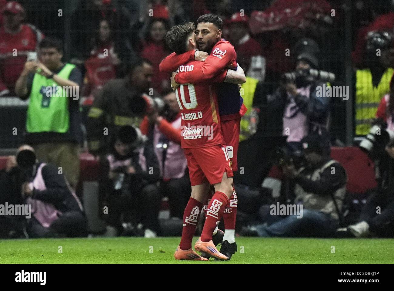 Toluca's Jesus Angulo, left, and Alexis Vega celebrate their side's ...