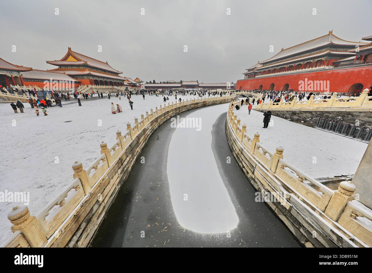 Tourists admire snow scenery at the Forbidden City in Beijing, China ...