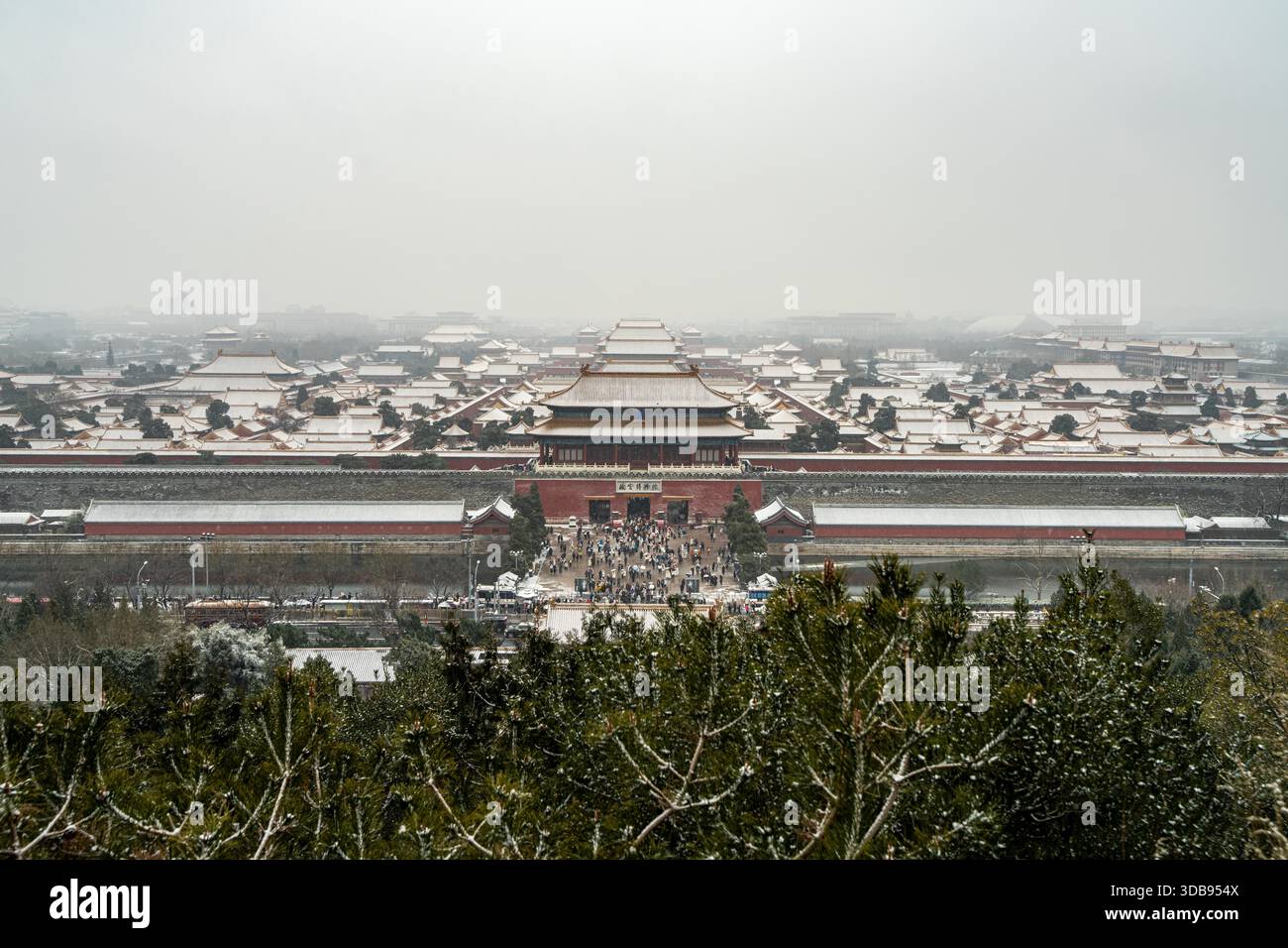 Tourists admire snow scenery at the Forbidden City in Beijing, China ...