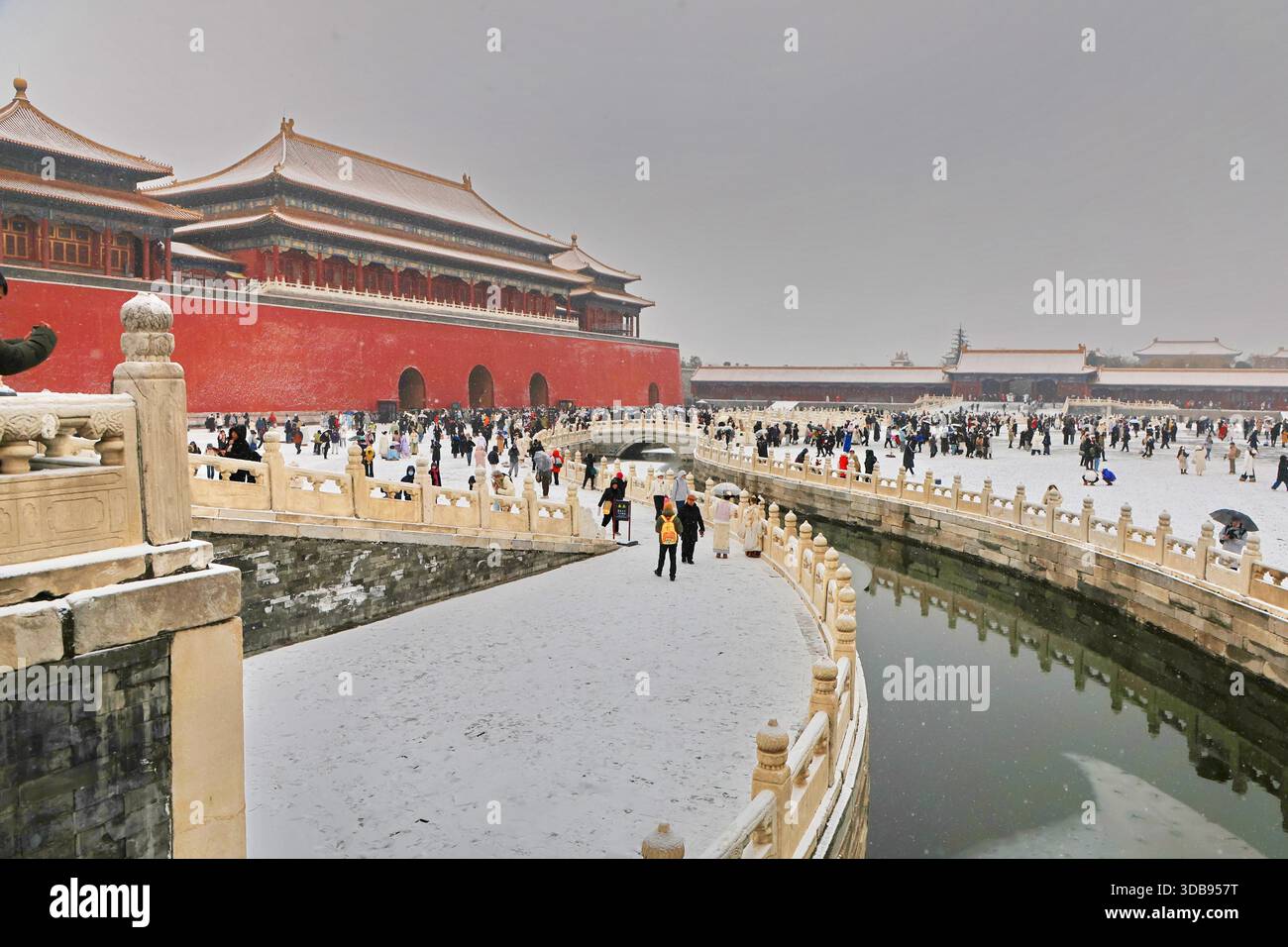 Tourists admire snow scenery at the Forbidden City in Beijing, China ...