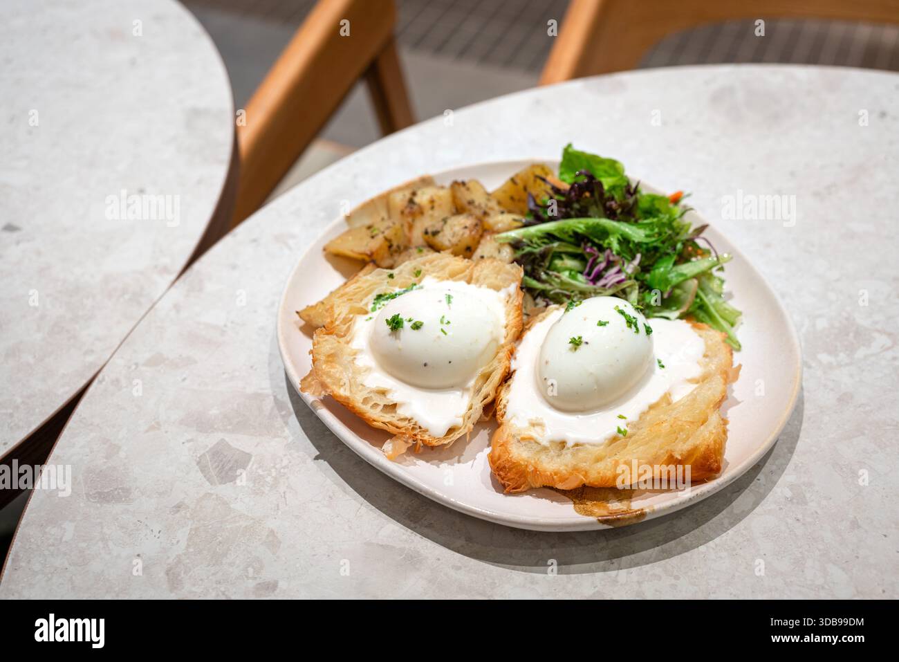 Eggs Benedict dish for breakfast. High angle view. Stock Photo