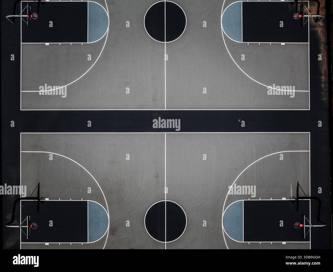Aerial view of stark geometry of basketball courts pops with clean ...
