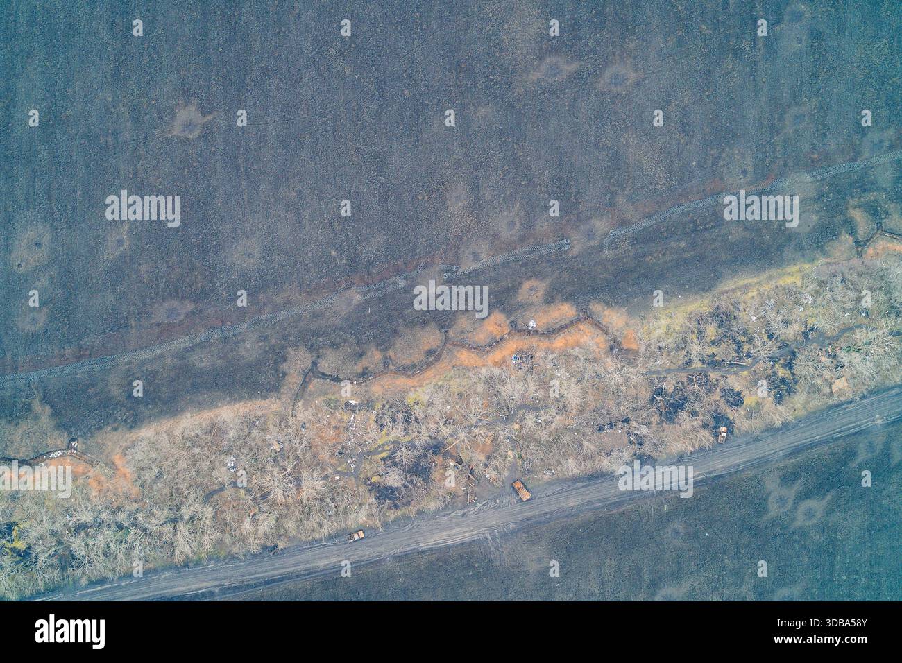 Aerial view of a defensive line featuring earthwork trenches with ...