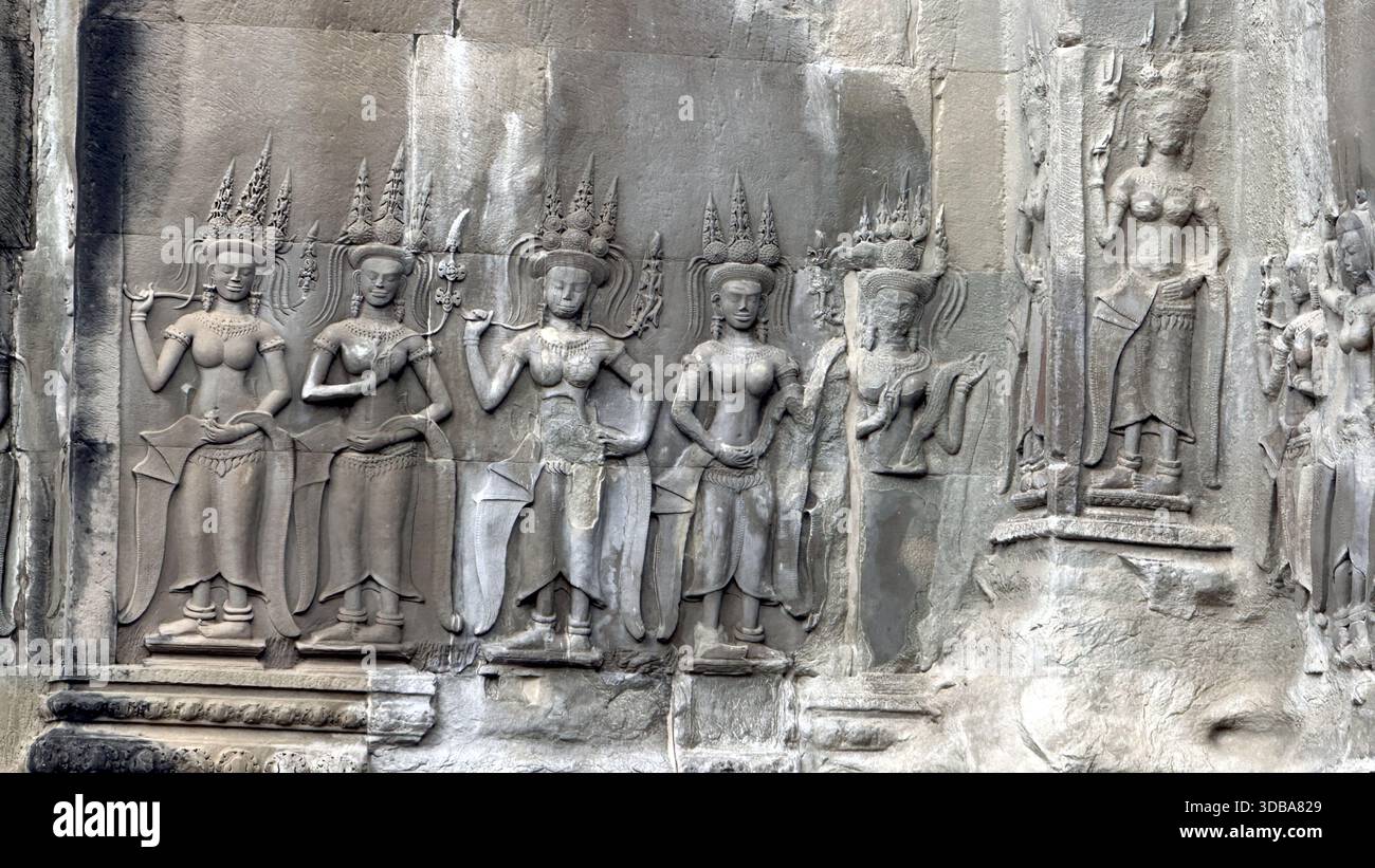 A Ritual Carved in Stone: The Apsara Reliefs - Stock Image