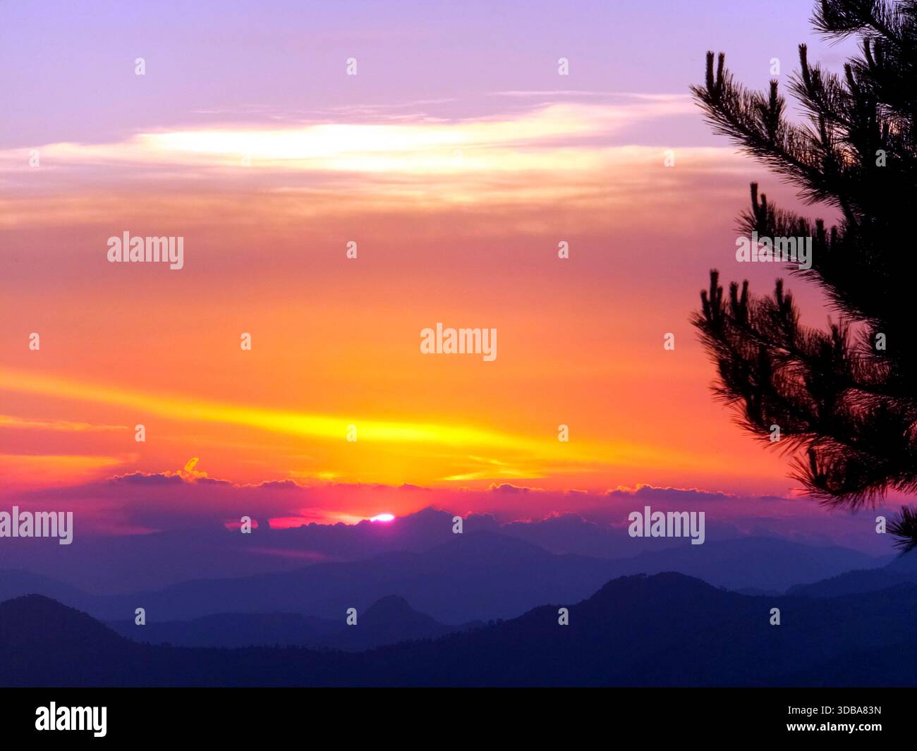 Scenic view of a campsite in the mountains during a dramatic sunset in Türkiye - Stock Image
