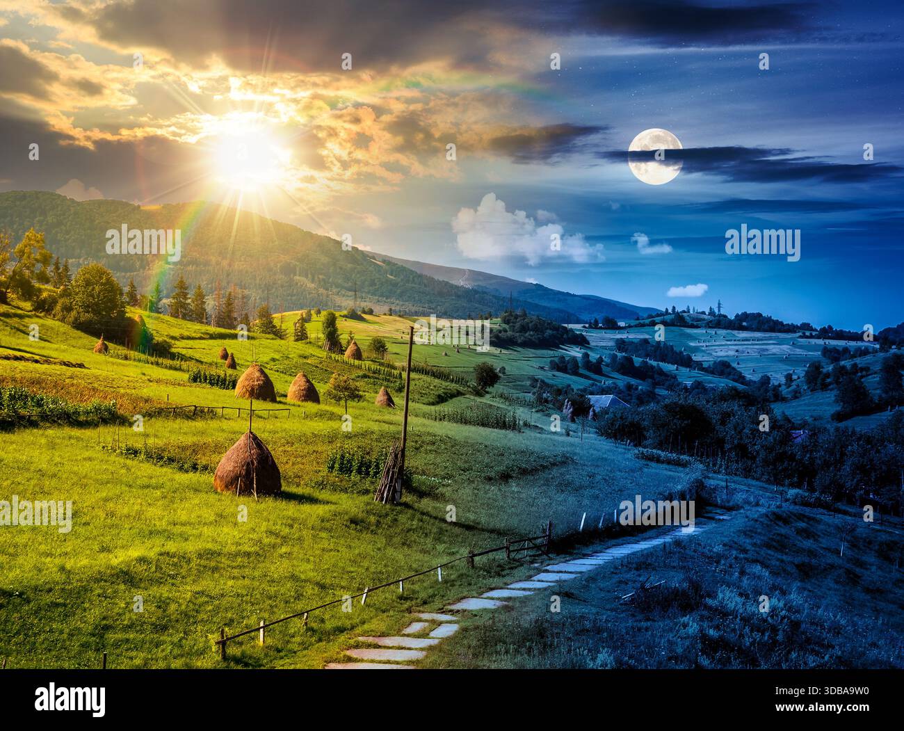 beautiful countryside scenery in summertime. day and night time change concept. haystack on grassy hillsides of mountain with sun and moon. rolling la Stock Photo