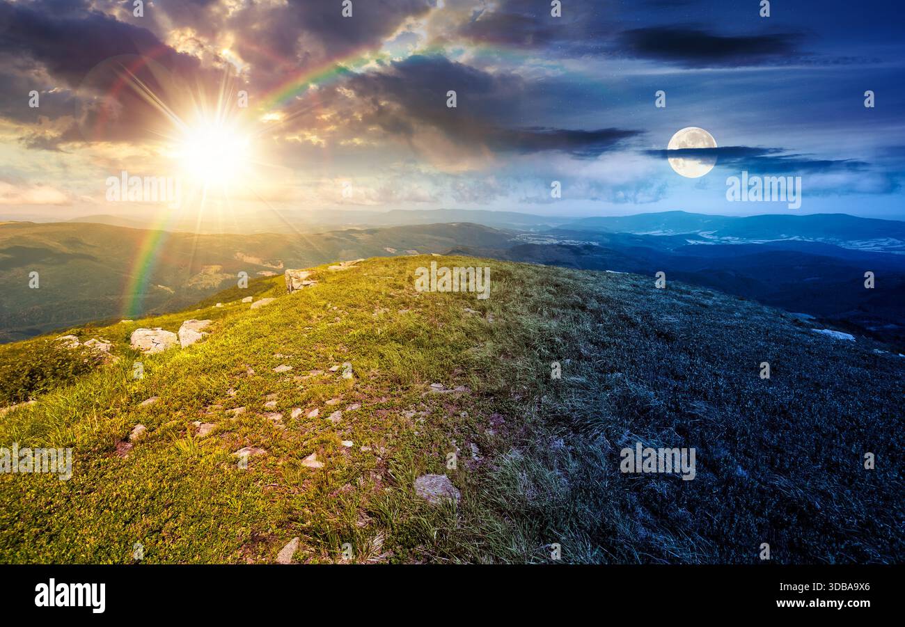 grassy slopes with boulders of mountain. day and night time change concept. beautiful summer solstice scenery in alpine green environment under sky wi Stock Photo