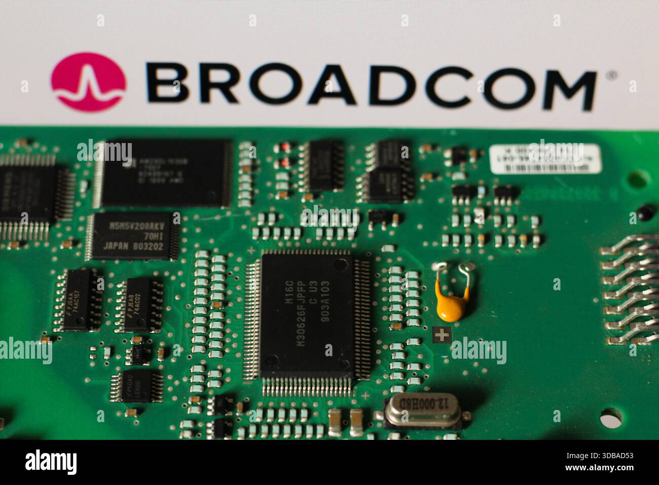 In this photo illustration, the Broadcom logo is seen displayed on a ...