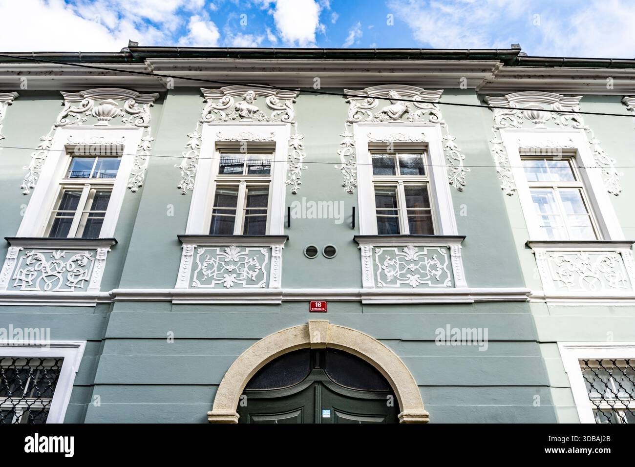Ornated facade of Salzburski Dvor Mansion in Vetrinjska ulica, Baroque building, once house of the archdiocese of Salzburg,  in Maribor, Slovenia Stock Photo