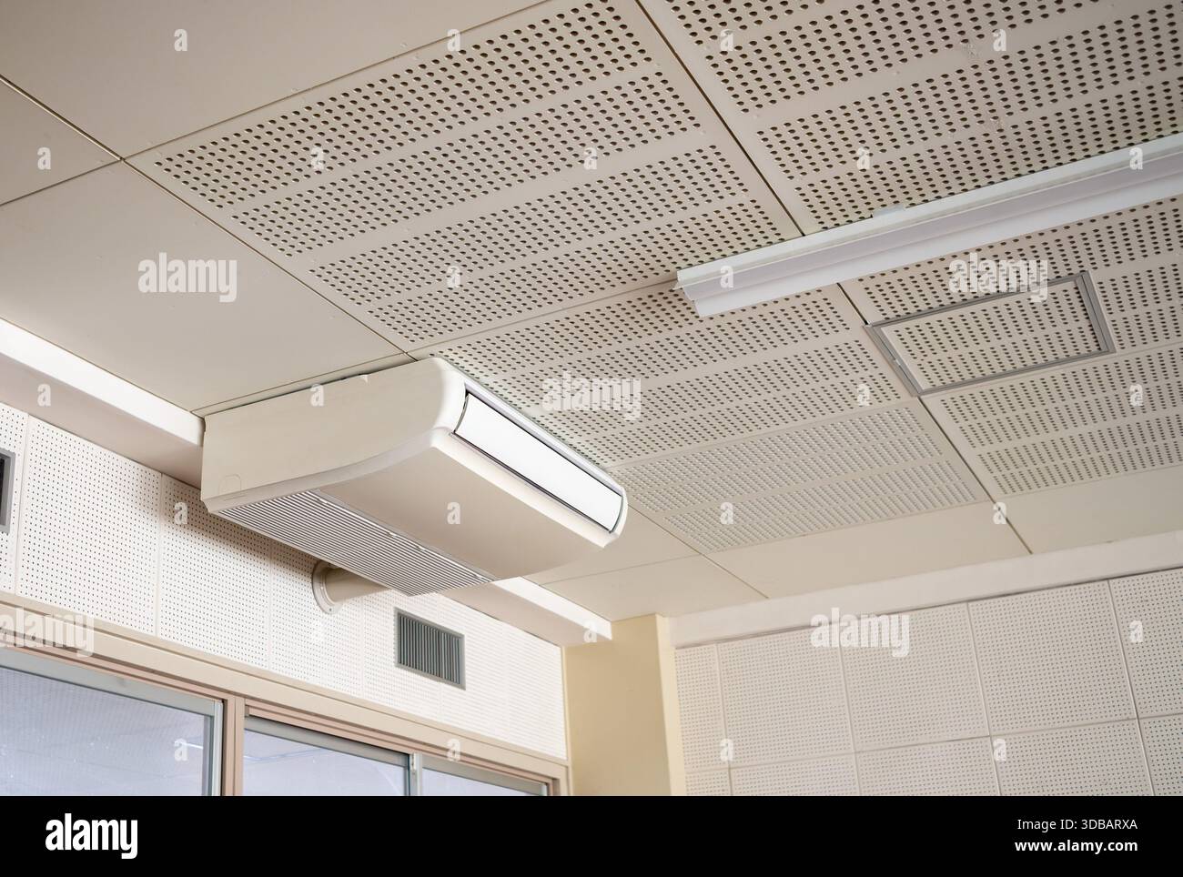 Non-Inverter Underceiling Air Conditioner for Commercial or Residential Use Stock Photo