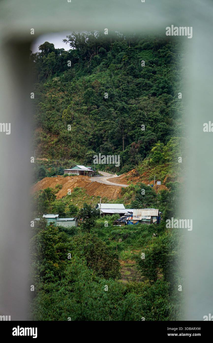 Lush green hillside road hi-res stock photography and images - Alamy