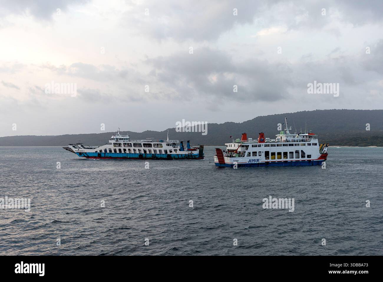 Public ferries crossing a strait between Bali and Java island in ...