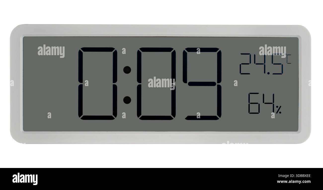 Large wall clock with white digits, alarm function, and temperature measurement. On a white background in isolation. Stock Photo