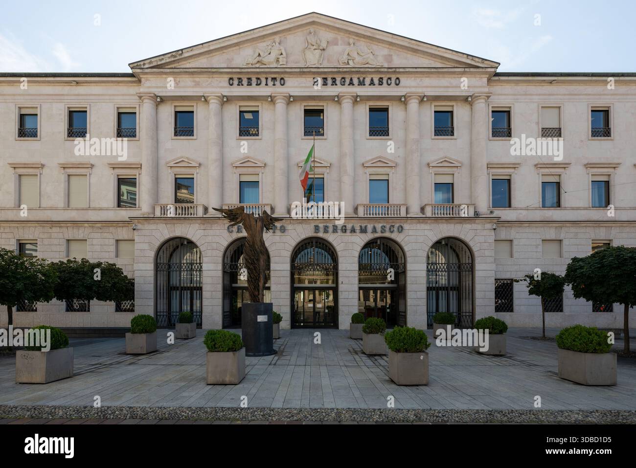 Bergamo, Italy - Jul 31, 2025: Facade of Credito Bergamasco Banco BPM  headquarters in Bergamo, Italy, neoclassical stone architecture with  Italian fla Stock Photo - Alamy, image size:1300x956