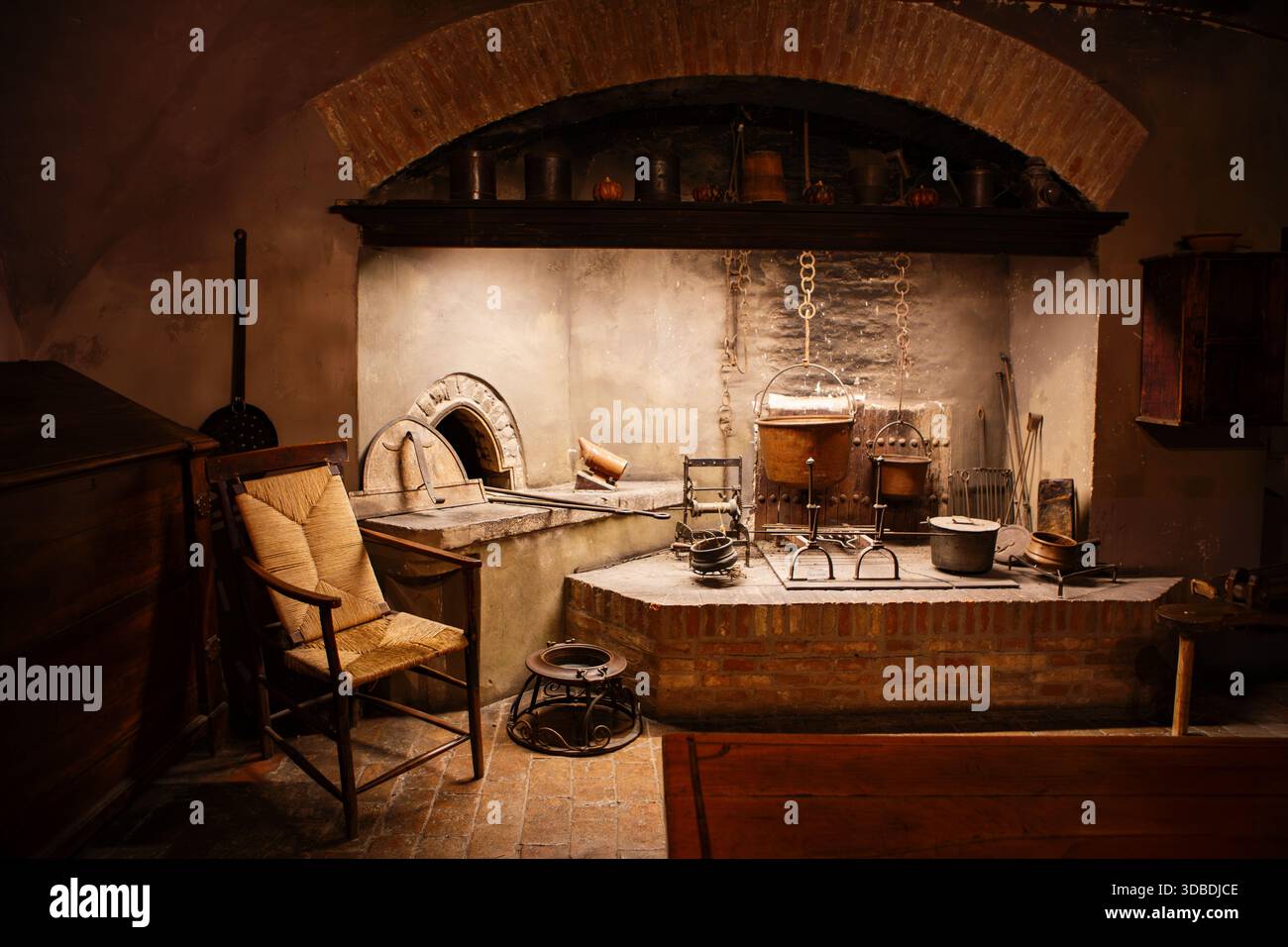 Ancient Italian kitchen with stone fireplace copper pots and rustic tools  represents the warmth of traditional rural culinary heritage Stock Photo -  Alamy, image size:1300x956