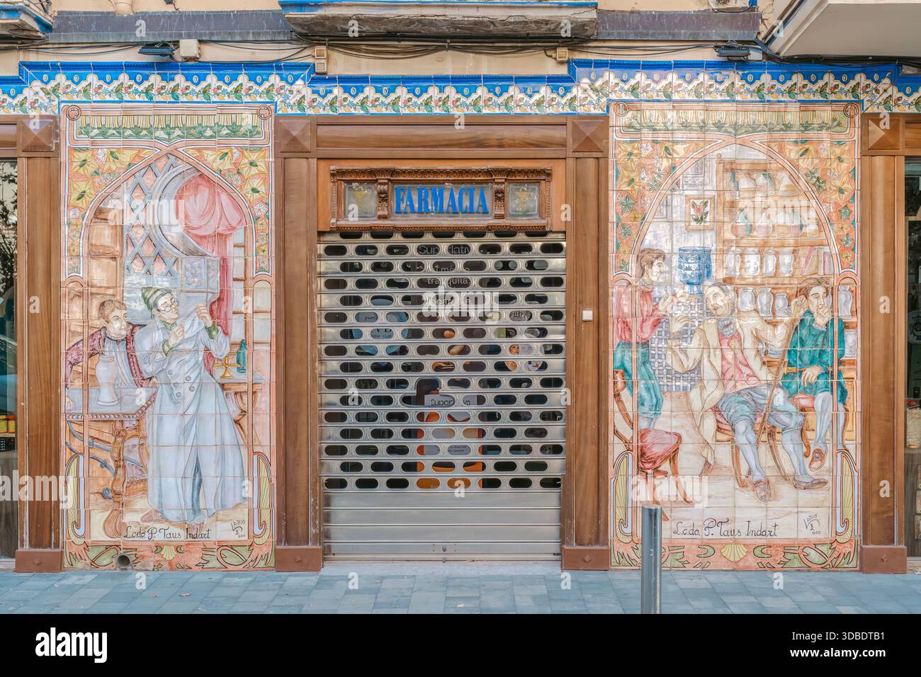 Traditional Spanish Pharmacy Entrance with Beautiful Modernist Tile Art Stock Photo