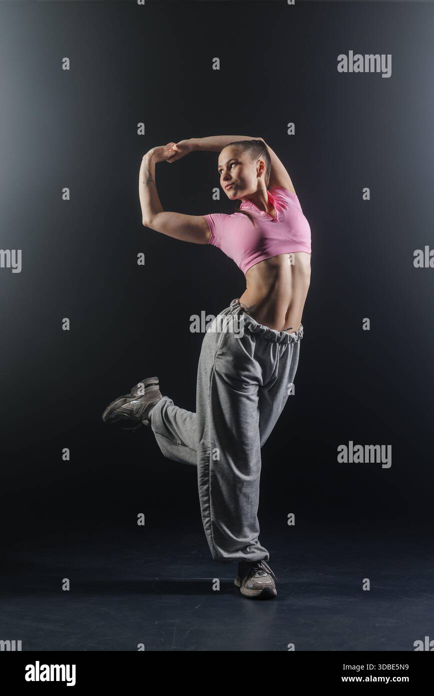 Portrait fitness woman spotlight hi-res stock photography and images ...