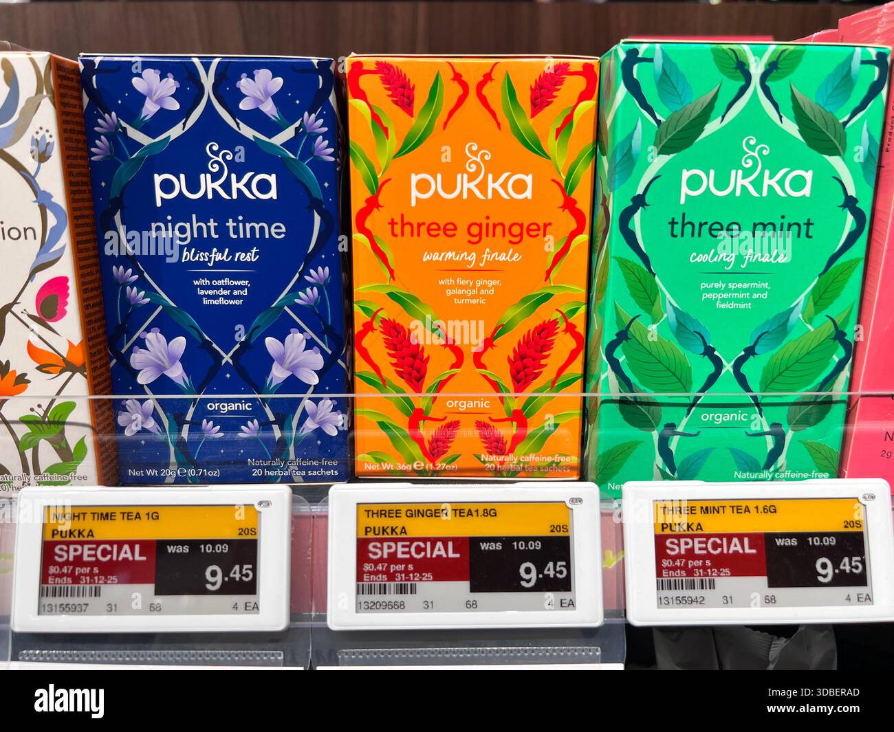 Variety Pukka organic brand tea, mint, ginger, night time. Each have different effect, stated pricing for consumer customer to make purchase in shop. - Smartphone Captured Stock Image