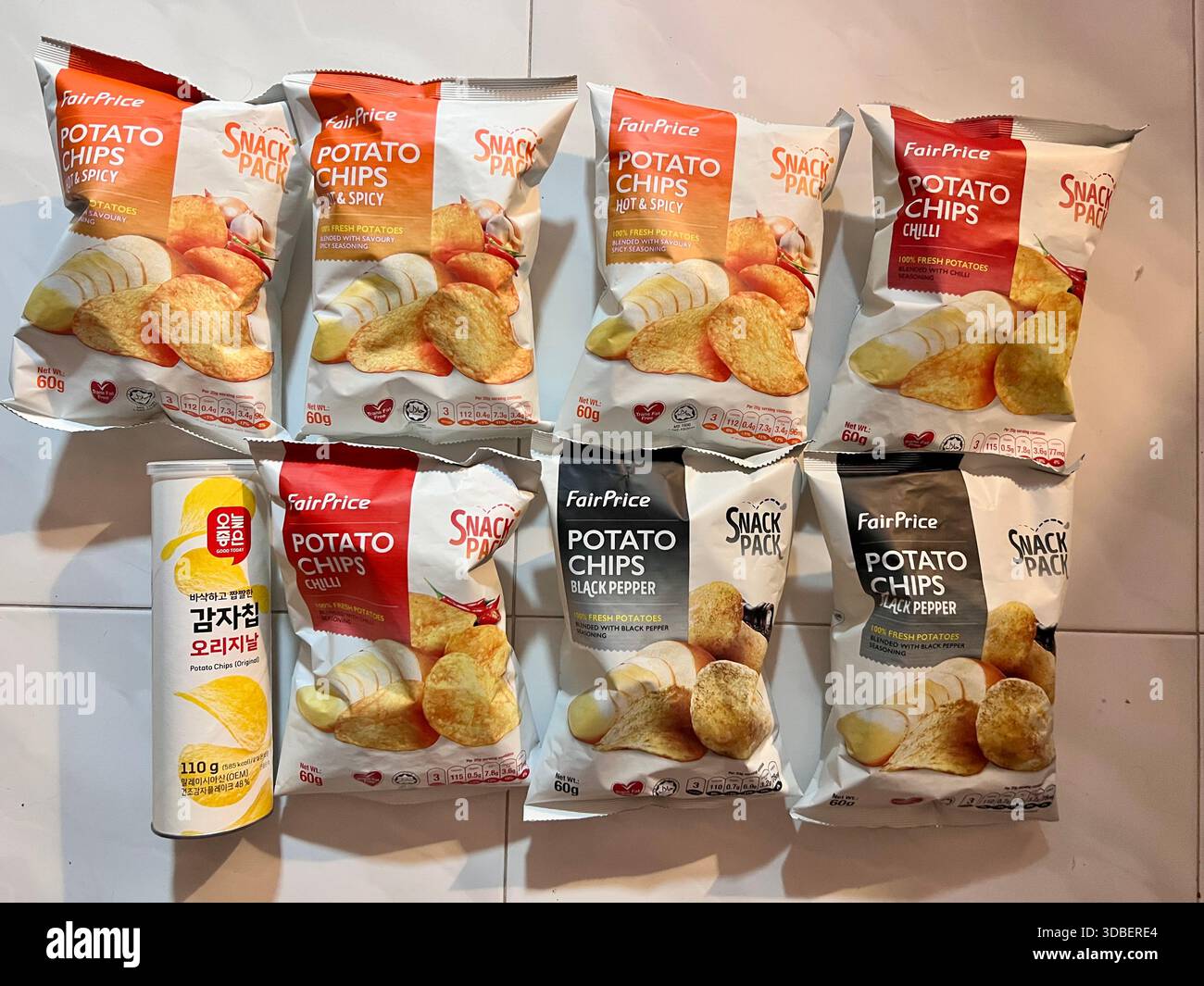 Variety of potato chips that is produce locally in Singapore and Korea. Flavour includes original, chilli, hot and spicy, black pepper. - Smartphone Captured Stock Image
