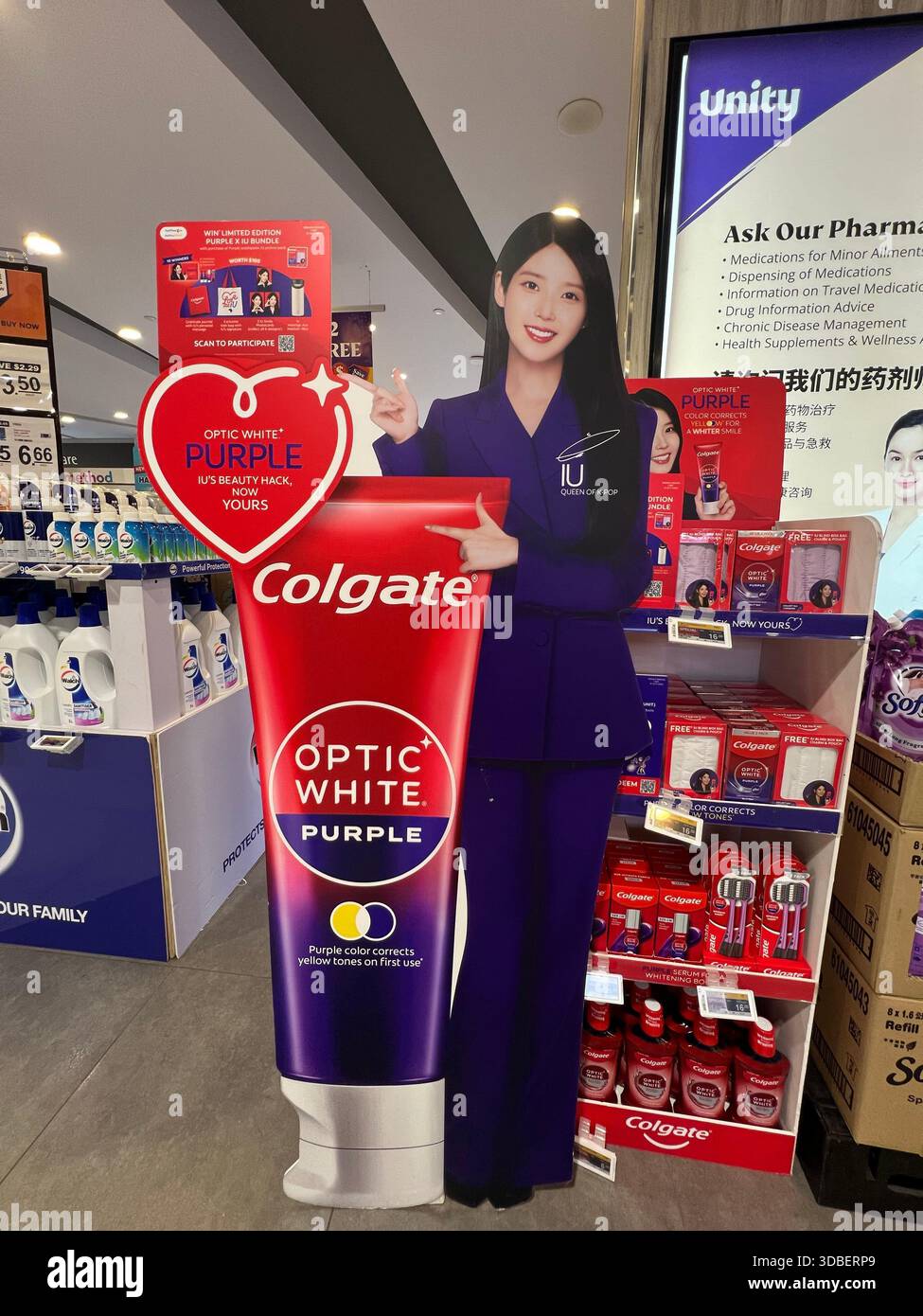 Korean singer artist IU standee place in supermarket, promoting Colgate optic white purple toothpaste, company hope to sell more products through her. - Smartphone Captured Stock Image