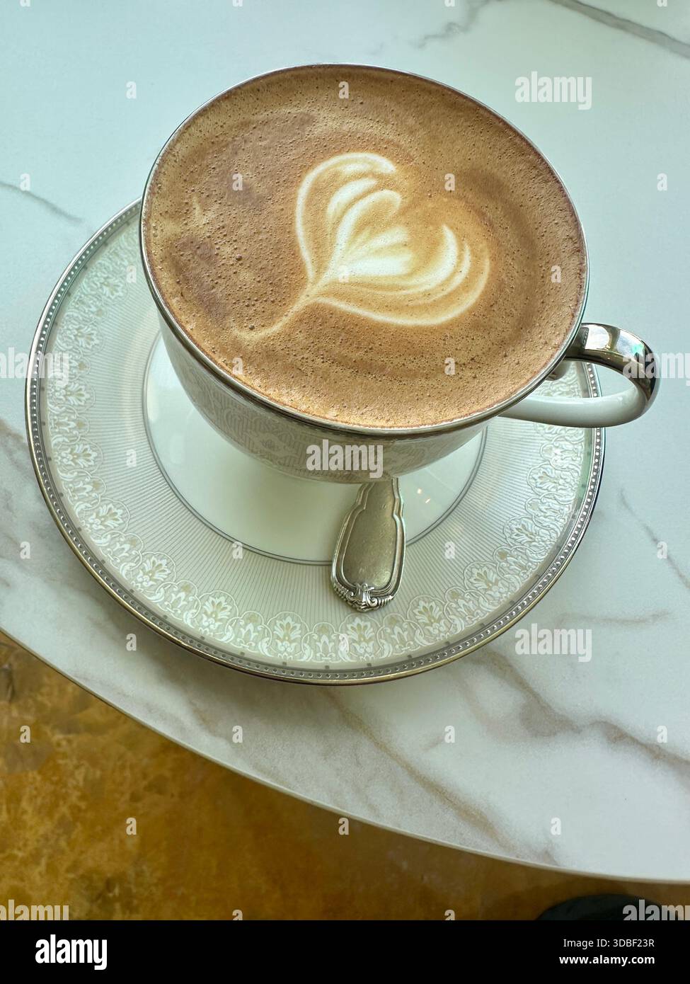expensive coffee on table - Smartphone Captured Stock Image
