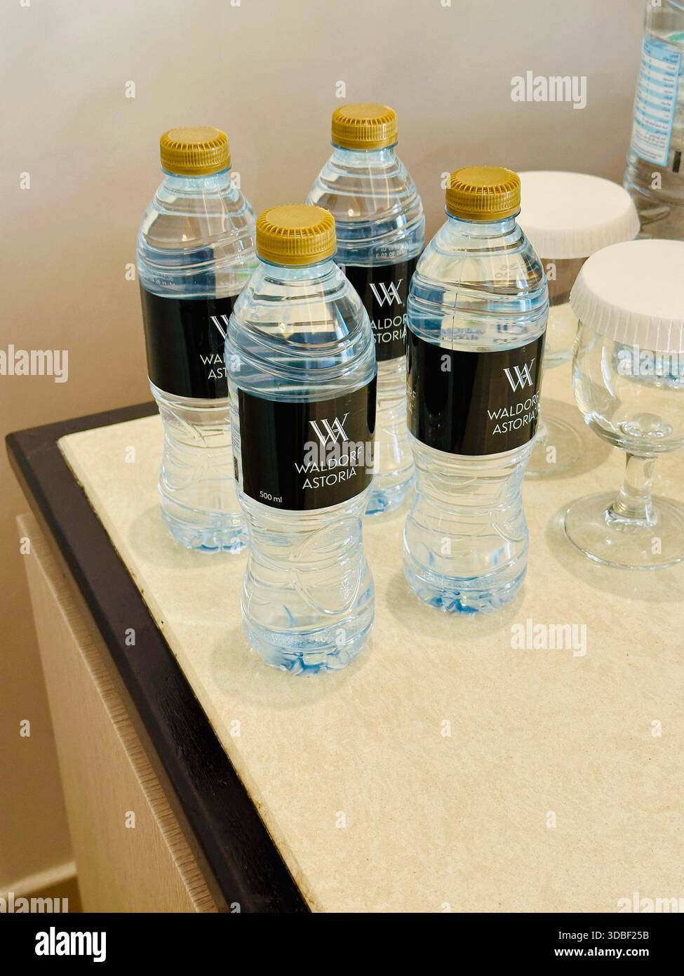 bottled water in hotel room - Smartphone Captured Stock Image