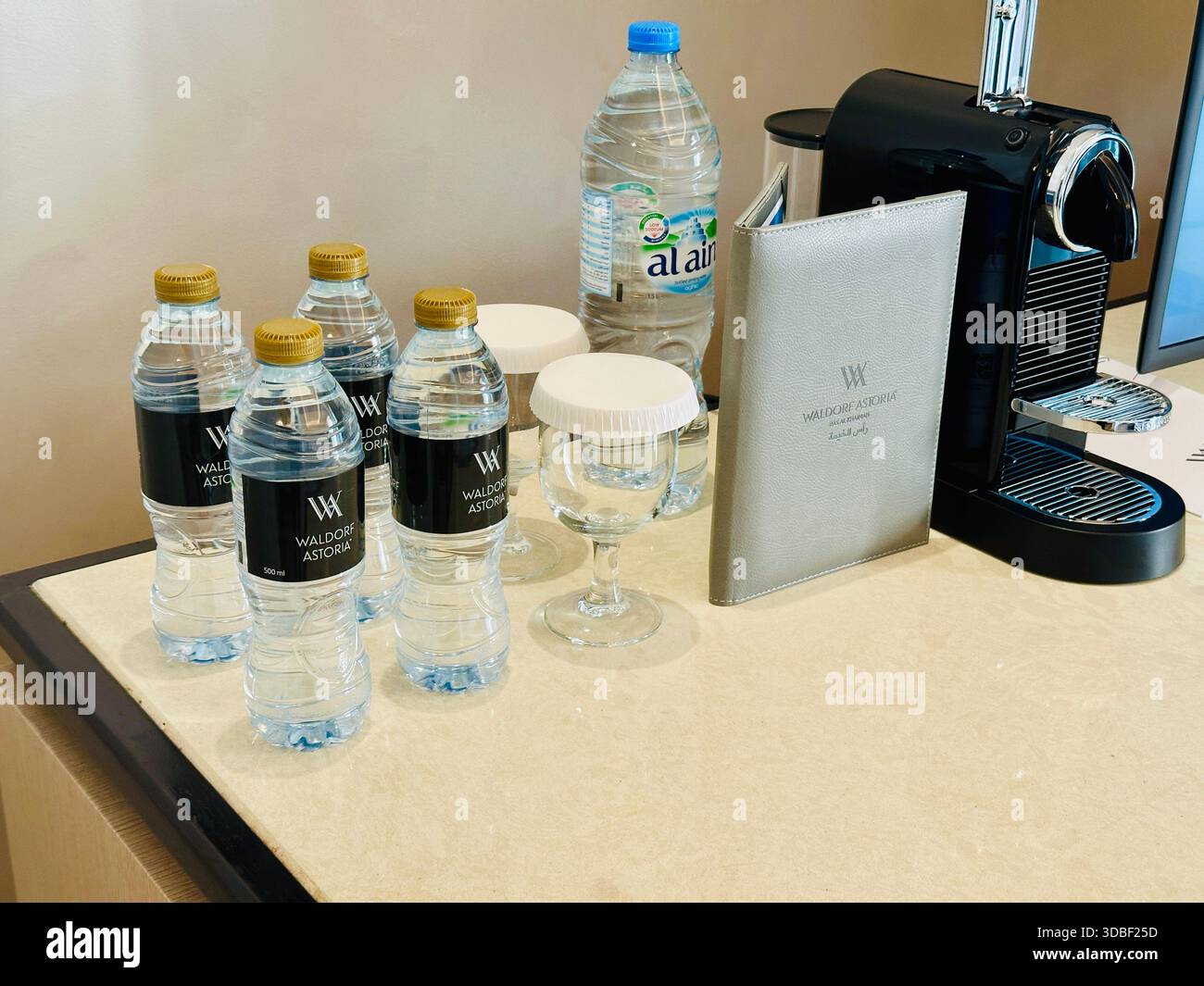bottled water in hotel room - Smartphone Captured Stock Image