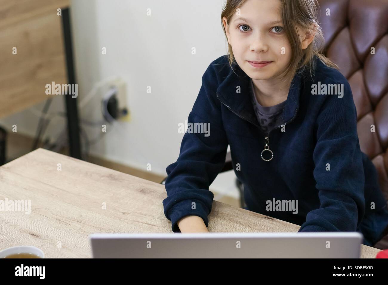 Preteen girl sitting school hi-res stock photography and images - Alamy