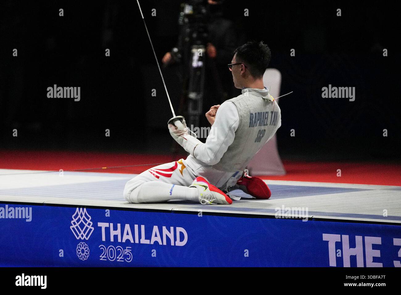 Singapore Raphael Juan Kang Tan celebrates after defeating Thailand's ...