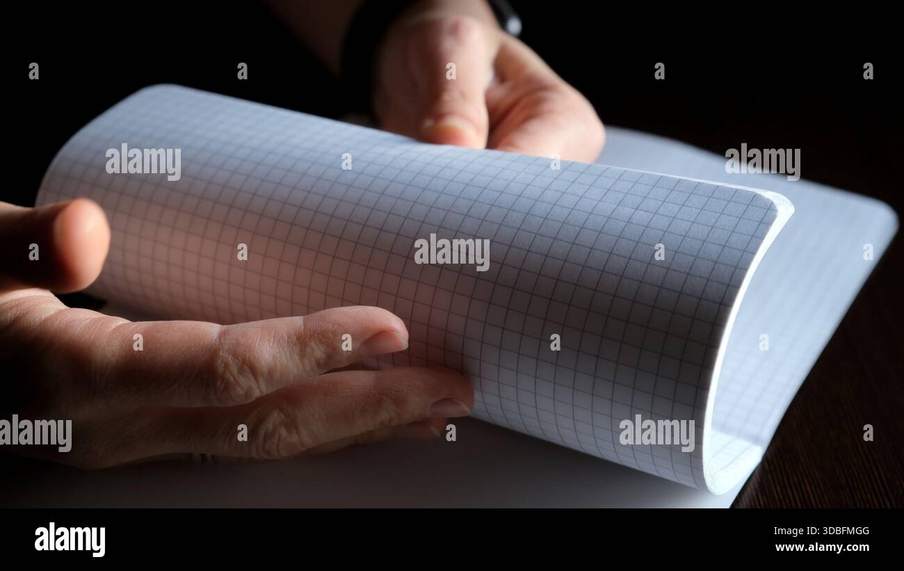 Turning checkered sheets in school hi-res stock photography and images ...