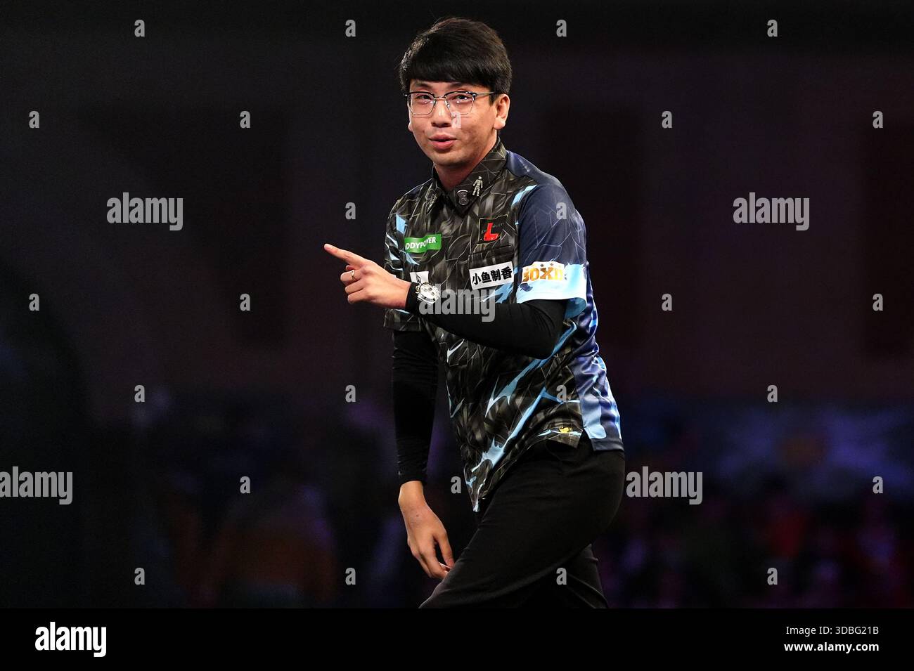Xiaochen Zong reacts on day six of the Paddy Power World Darts ...