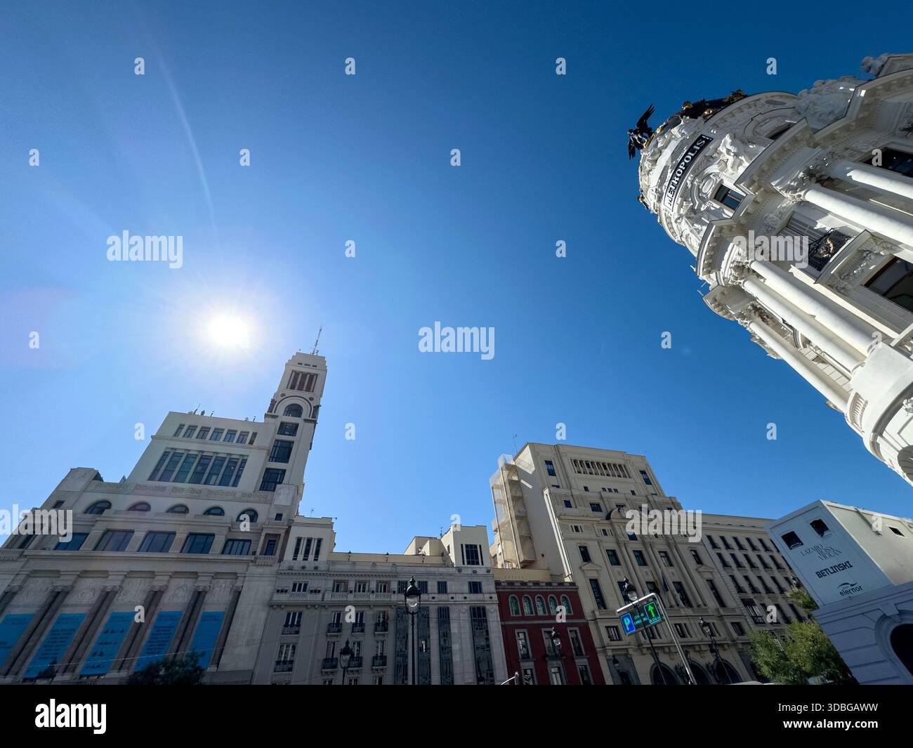 Winged statue on top of Metropolis Building , early 20th-century landmark located at the corner of Gran Vía and Calle de Alcalá in Madrid. - Smartphone Captured Stock Image