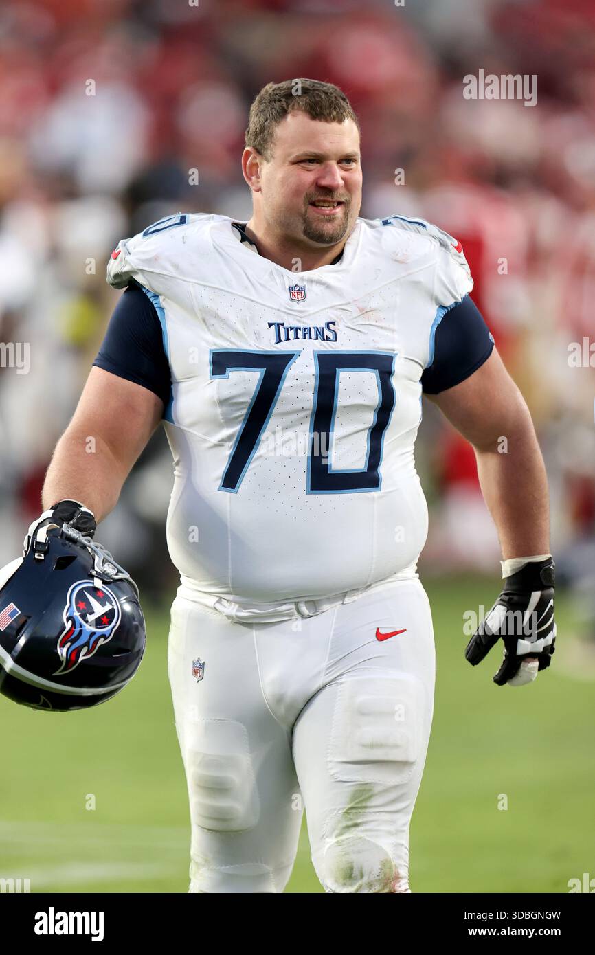 Tennessee Titans guard Kevin Zeitler (70) walks off the field during an ...