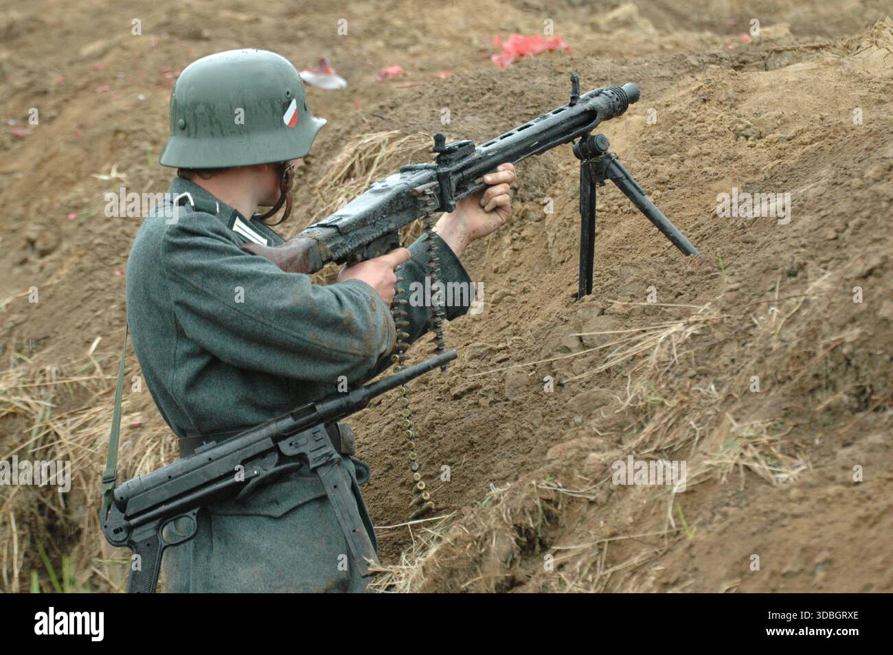 German Wehrmacht soldier operating machine gun from captured trench ...