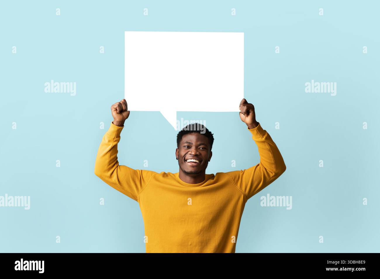 Cheerful black man holding empty communication chart Stock Photo