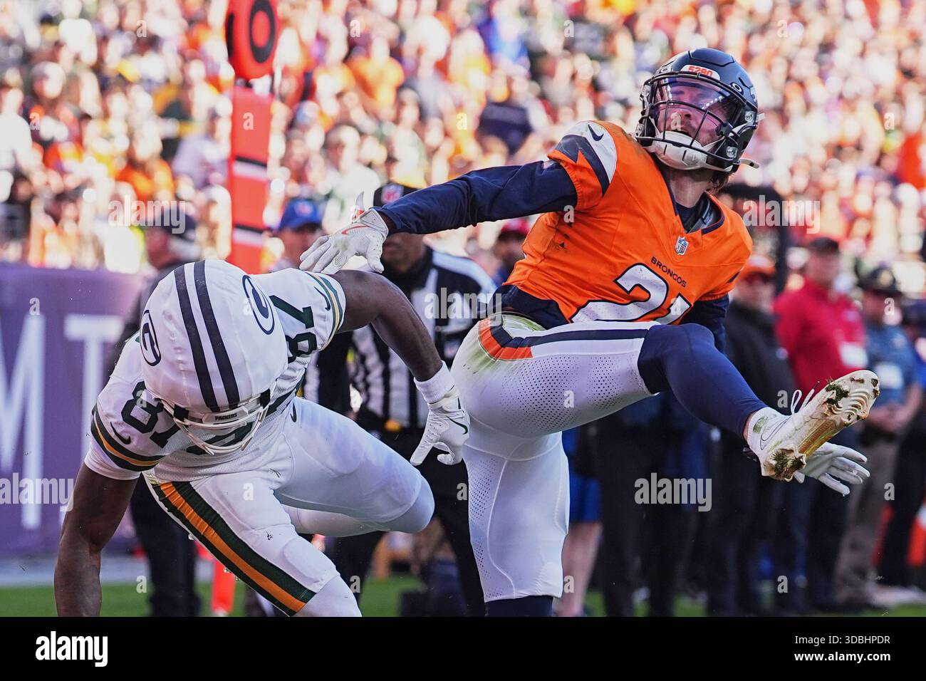 Riley Romeo Denver Broncos cornerback Riley Moss (21) breaks up pass intended for ...